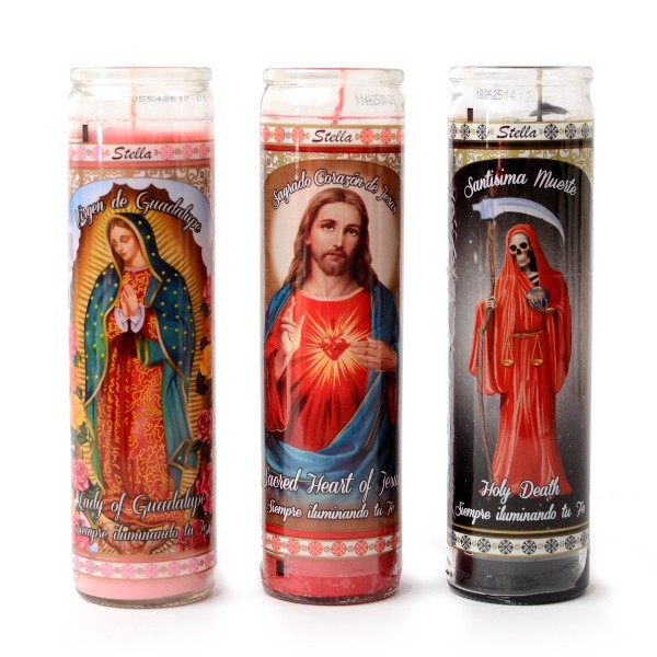 Candle in a glass with holy motifs from Mexico